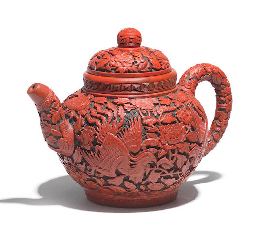 A VERY RARE IMPERIAL TWO-COLOUR CINNABAR-LACQUERED YIXING TEAPOT AND COVER