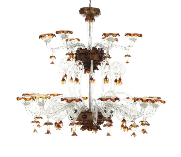 A Venetian 20th century clear and amber coloured glass 18-light chandelier. H. 80. Diam. 100 cm.