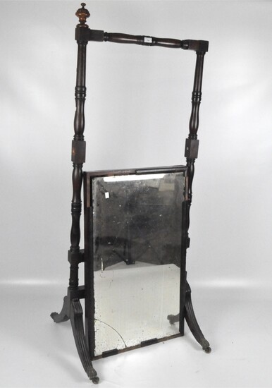 A Victorian cheval mirror and stand