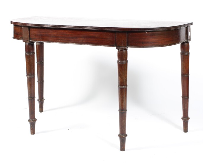 A Victorian mahogany D-shaped side table
