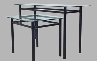 A black steel console table with glass top, 67cm high, 127cm wide, 45cm deep, together with matching side table, 51cm high, 66cm wide, 57cm deep (2)