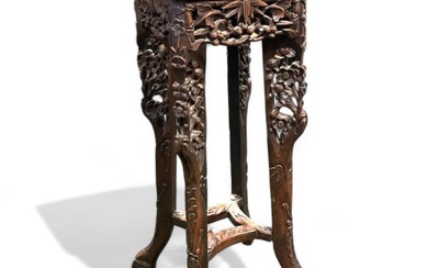 A carved Chinese hardwood Jardinière stand. Approximately 23.5cm x 24cm...