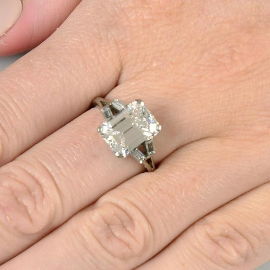A cut-corner rectangular-shape diamond single-stone