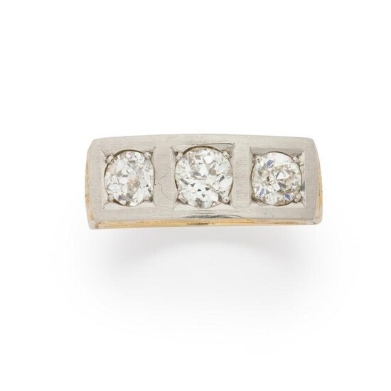 A diamond and eighteen karat bi-color gold ring