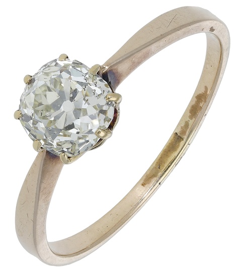 A diamond single stone ring, the old cushion-cut diamond between tapered shoulders,...