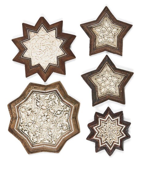 A group of 20th century carved bone inlaid wood panels in the Mamluk style, 10.8cm., 11.6cm., 11.6cm., 15cm. and 17.6cm. high (5) Provenance: Private collection of Oliver Hoare 1945-2018