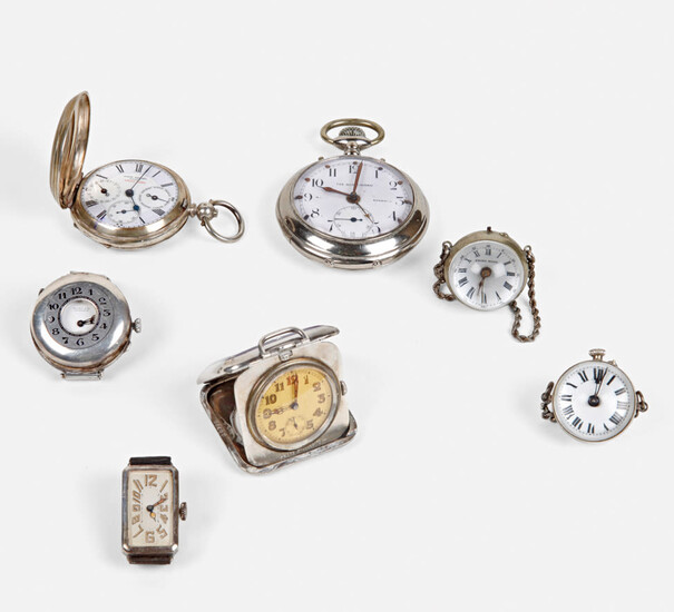 A group of seven silver watches