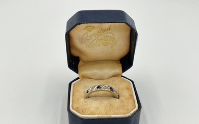 A hallmarked Birmingham 9ct white gold diamond and sapphire ...