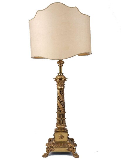 A late Victorian adjustable brass column table lamp, late 19th century, with pierced column and square base with paw feet, 50cm high to top of column It is the buyer's responsibility to ensure that electrical items are professionally rewired for use.