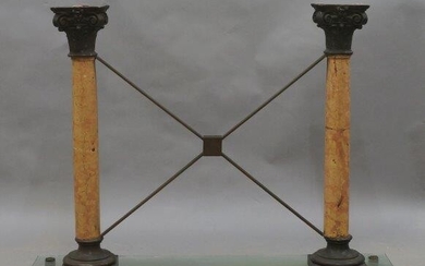 A marble and bronze console table, with Corinthian column supports joined by x-frame stretcher, raised on glass base, lacking top, 87cm high, 120cm wide, 40cm deep (VAT charged on hammer price)