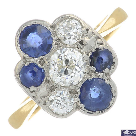 A mid 20th century gold and platinum circular-shape sapphire and old-cut diamond ring.