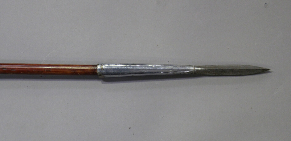 A mid to late 20th century lance with chrome finished triangular spear tip and turned chromed butt