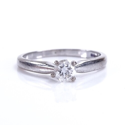A modern 18ct white gold 0.3ct solitaire diamond ring, diamo...