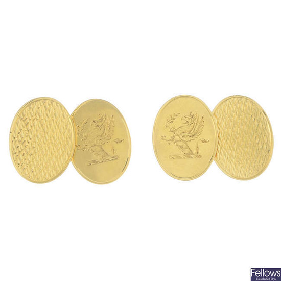 A pair of 1920s 18ct gold oval-shape cufflinks, with