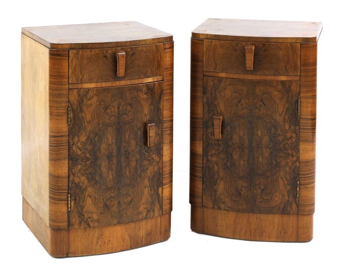 A pair of Art Deco walnut bedside cabinets