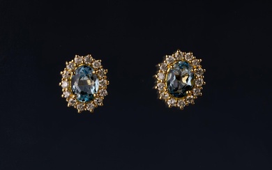 A pair of aquamarine and diamond cluster ear studs