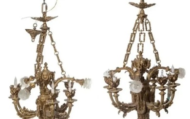 A pair of cast-bronze Empire-style chandeliers