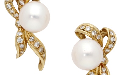 A pair of cultured pearl and gem-set earrings, each stud comprising a...