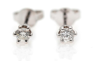 SOLD. A pair of diamond ear studs each set with a diamond weighing a total of app. 0.30 ct., mounted in 18k white gold. TW/VS. (2) – Bruun Rasmussen Auctioneers of Fine Art