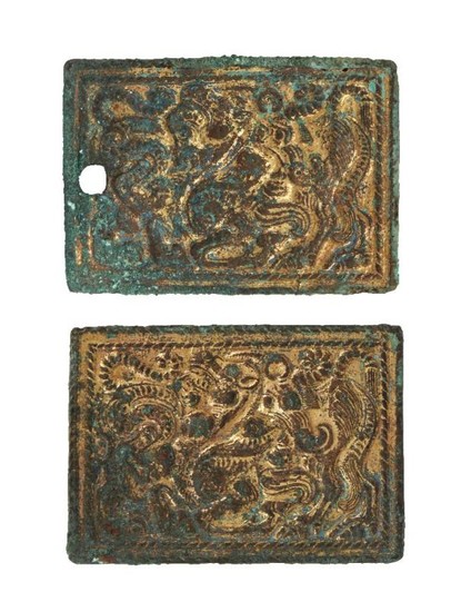 A pair of gilded bronze plaques, 3rd-1st...