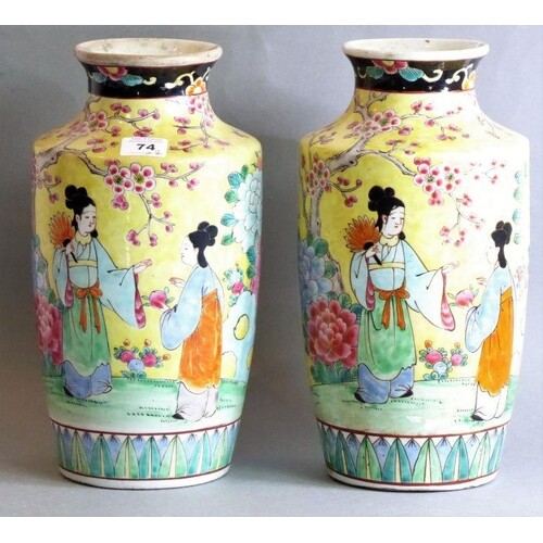 A pair of late 19th century Chinese porcelain vases; female ...