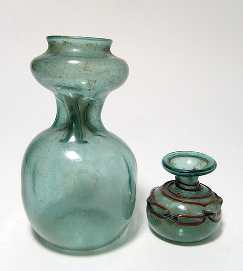 A pair of modern Roman-style glass bottles