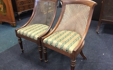 A pair of regency mahogany bergère Gillows style chairs with...