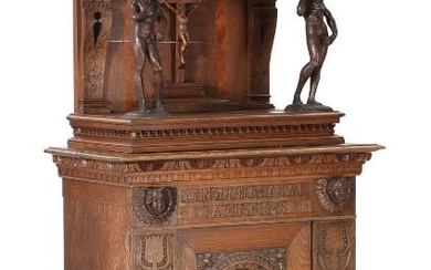 A partly 16th-19th century Renaissance oak cabinet, richly carved with figures in...