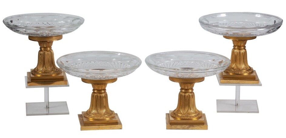 A set of four Charles X gilt-bronze and cut-glass...