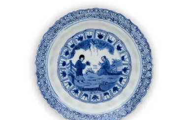 A small Chinese blue and white 'scholar and beauty' moulded barbed-rimmed dish,...