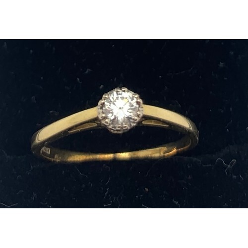 A solitaire diamond ring set in 18ct yellow gold. Size P/Q. ...