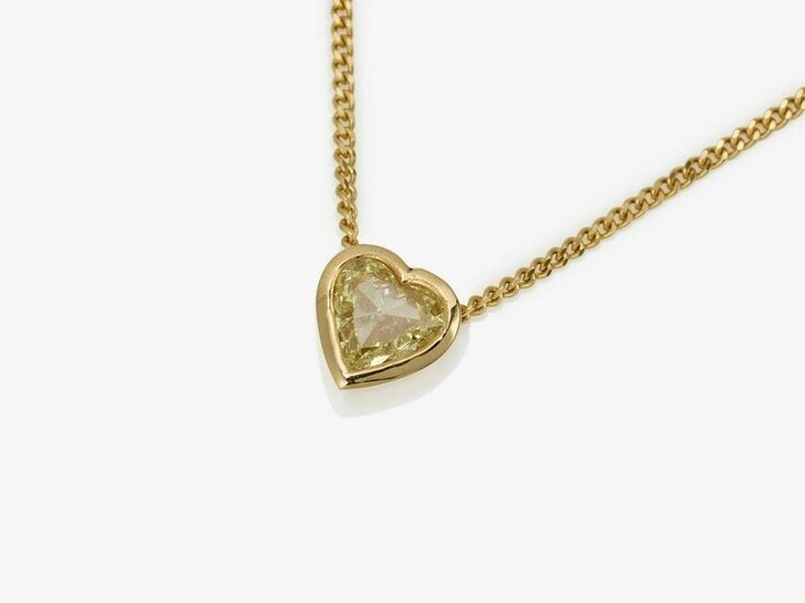 A solitaire necklace with a fine yellow diamond heart