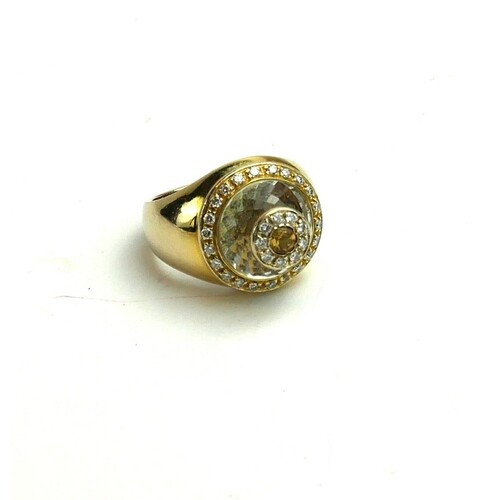 AN 18CT GOLD, DIAMOND, CITRINE AND QUARTZ CLUSTER RING The s...