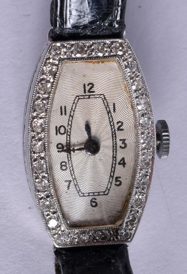 AN ART DECO 19CT GOLD AND DIAMOND COCKTAIL WATCH. 1.5