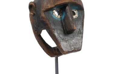 African Bamana carved wood tribal monkey mask on stand with blue polychrome and metal accents. 22