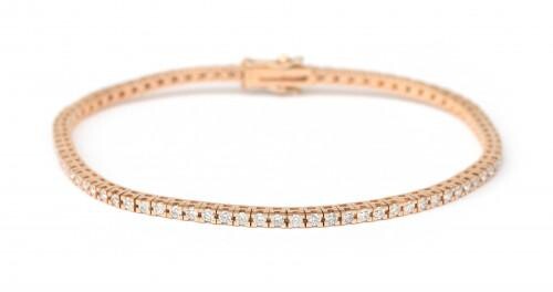An 18 karat rose gold diamond tennis bracelet. Featuring eighty two brilliant cut diamonds of ca. 1.7 ct., ca. G-H, ca. VS. Gross weight: 8.1 g.
