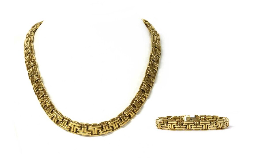 An 18ct gold necklace and bracelet suite, by Garrard