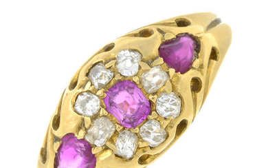 An early 20th century 18ct gold ruby and old-cut diamond cluster ring.