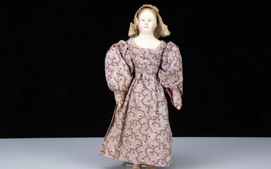 An interesting early papier-mâché shoulder head doll