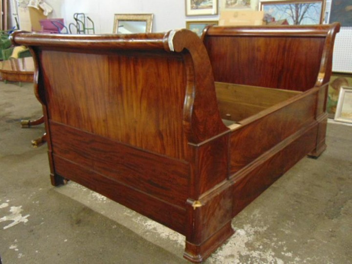 Antique mahogany sleigh bed, has some loss of molding