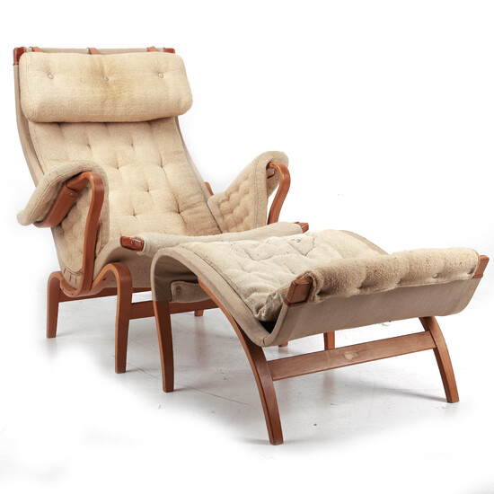 BRUNO MATHSSON. Armchair, Pernilla with footstool, beech, canvas, wool upholstery, Dux.