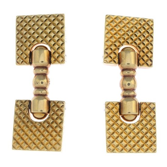 CARTIER - a pair of gold cufflinks. Each designed as
