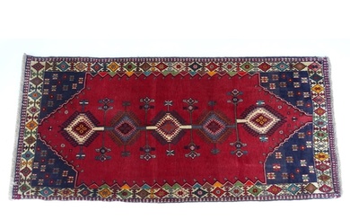 Carpet / Rug: A South West Persian Qashqai rug the red groun...
