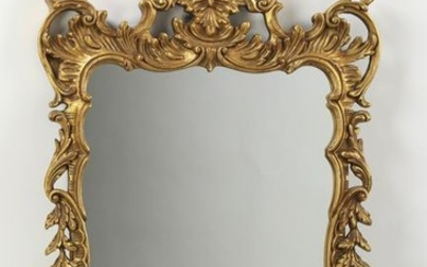 Carved and gilt-decorated Rococo style wall mirror