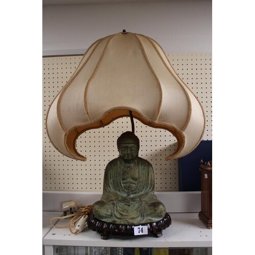 Chinese Bronze Buddha in seated pose mounted lamp on plinth ...