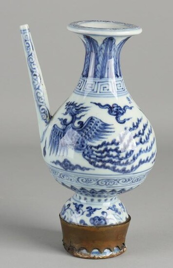 Chinese porcelain pitcher with bird of paradise /