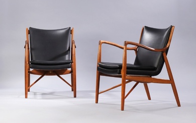 Finn Juhl. A pair of rare FJ 45 armchairs, anniversary models in oiled walnut (2)