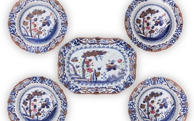 Five Chinese export enamelled blue and white plates, 18th century, comprised of four circular plates and a rectangular dish, similarly painted in underglaze blue, gilt and famille rose enamels with birds and flowers to the centre with a band of...