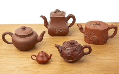 Group of five Yixing teapots Chinese, 19th/20th Century to include...