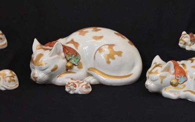 Group of six graduated Japanese Kutani porcelain sleeping cats